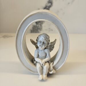Beautiful White Cherub Figurine Angel Sitting In Letter "O"